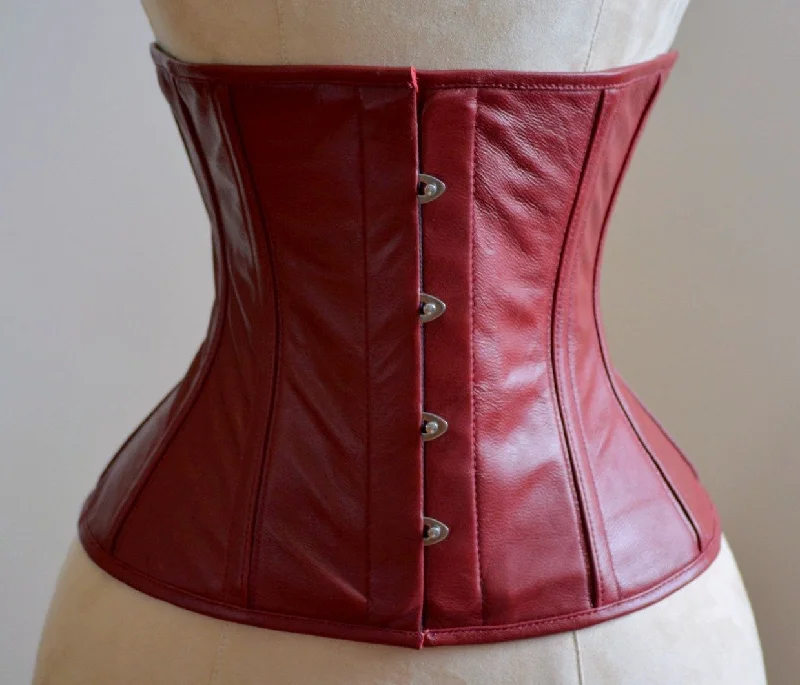 High quality lambskin waist steel-boned authentic corset of dark red color. Corset for tight lacing and waist training, steampunk, gothic