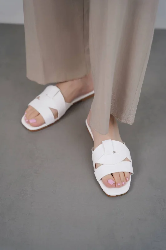 STRAPPY WOVEN SLIDES